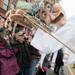 A group gasps as a papier-mache puppet jolts toward them during FestiFools April 1 in Ann Arbor. Chris Asadian | AnnArbor.com